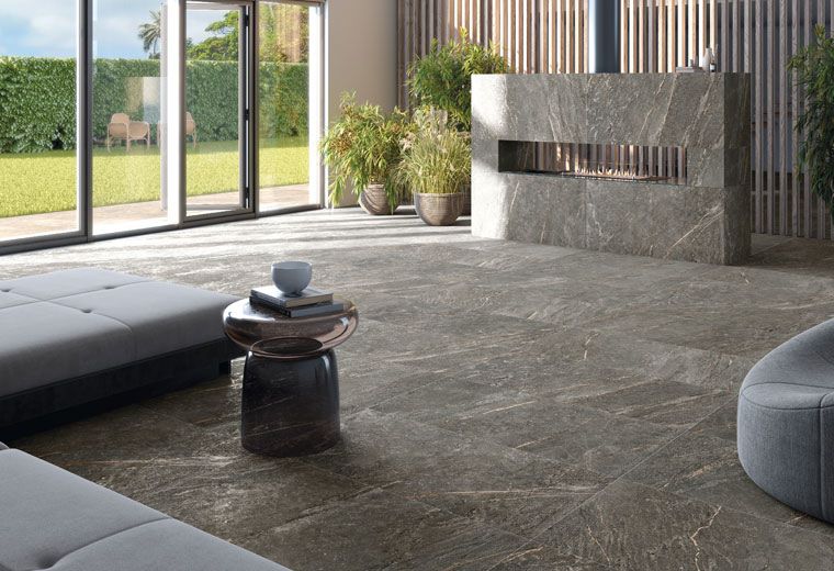 Stone-effect floor tiles in a modern living room